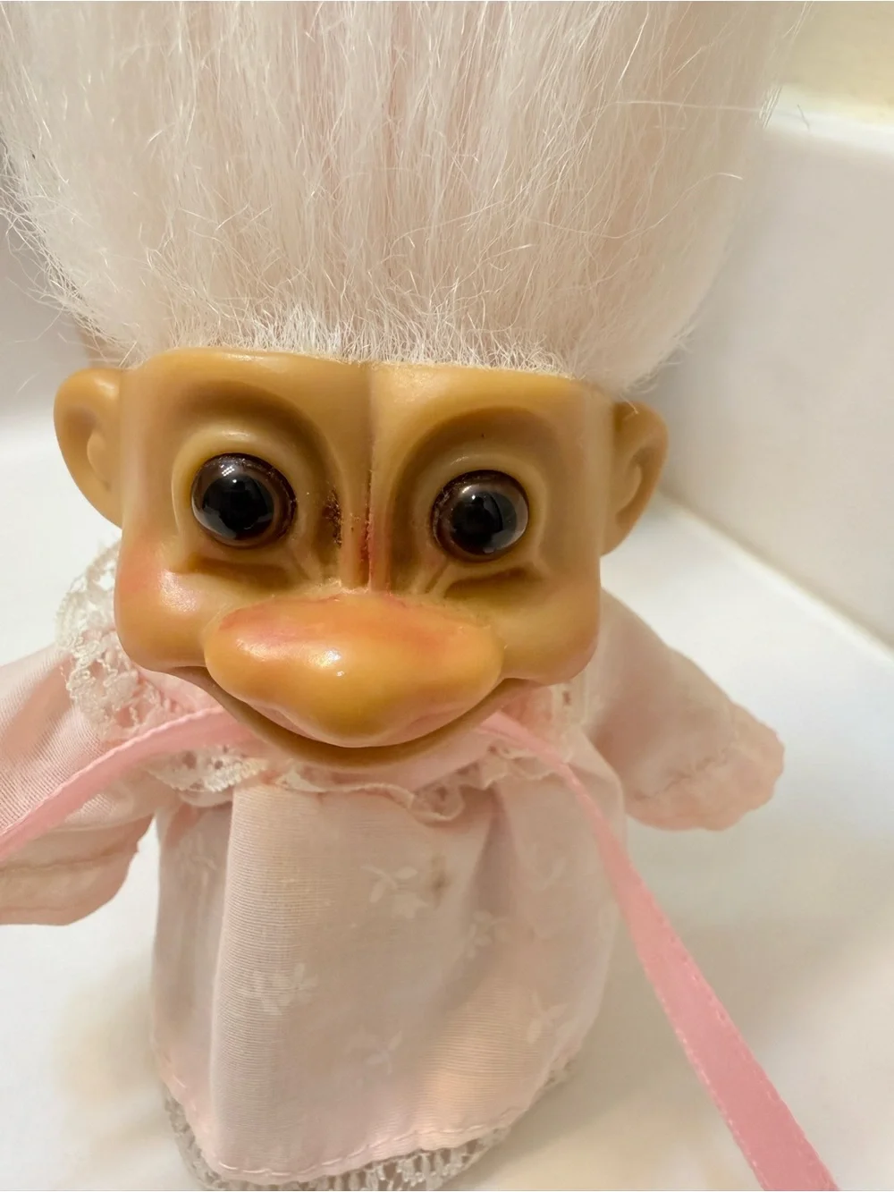 Russ Pink-Clad Baby Troll with White Hair Bath Toy